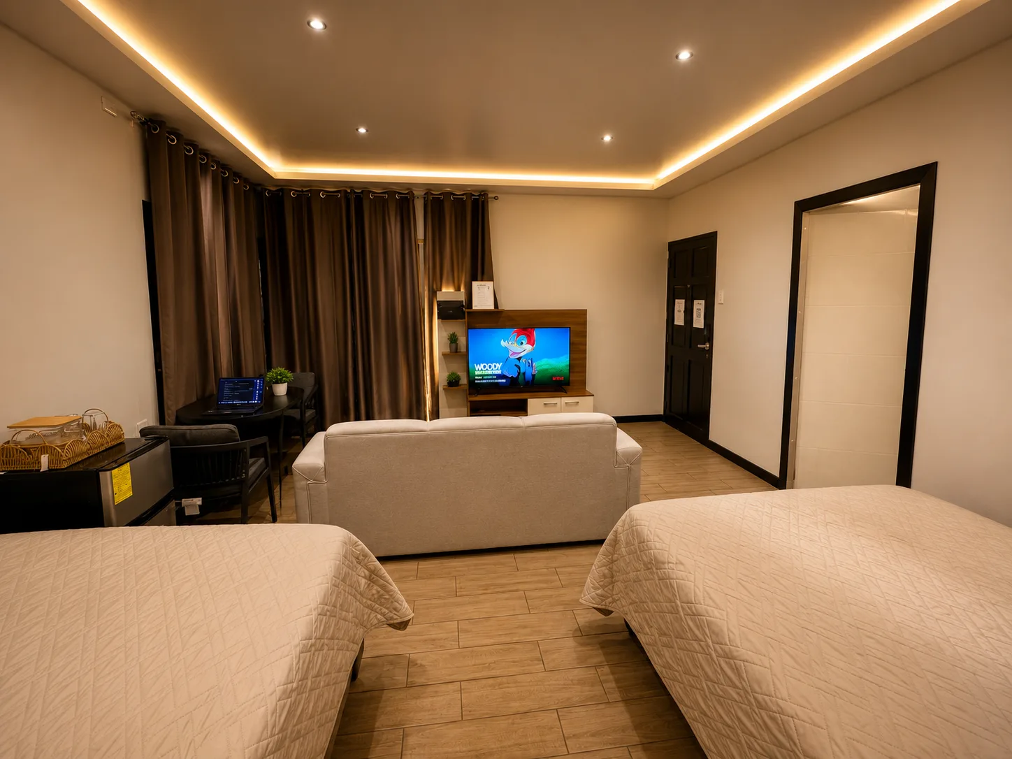 Sala y camas de Horizonte Loft